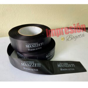 Impresión Marquillas por rollo en satín negro de 4.0 cm, impreso tinta blanco 1 cara